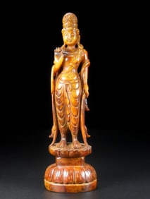An Exquisite Archaic Jade Buddha Statue