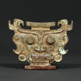 An Exquisite Archaic Jade Human facial Pattern Ornament