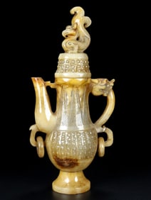 An Exquisite White Jade Auspicious Beast Pattern Ewer