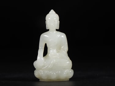 An Exquisite White Jade Buddha Statue