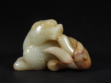 An Exquisite White Jade Auspicious Beast Ornament