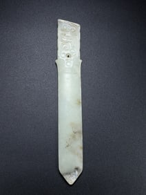 An Exquisite Archaic Jade Sword Ornament