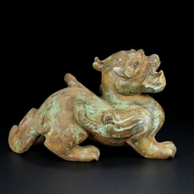 An Exquisite Archaic Jade Auspicious Beast Ornament