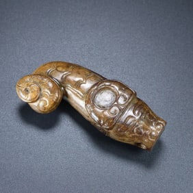 An Exquisite Archaic Jade Auspicious Beast Ornament