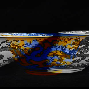 An Exquisite Yellow Ground Blue and White Dragon Pattern Bowl: An Exquisite Yellow Ground Blue and White Dragon Pattern Bowl,Ming Dynasty,China,Xuande Six-character Mark,Size:3.9inx8.7in &#40644;&#22320;&#38738;&#33457;&#40857;&#32441;&#30871;,&#20013;&#22269;&#2