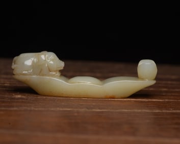 An Exquisite White Jade Pig Hand Piece