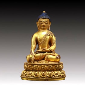 A Solemn Gilt Bronze Statue of Sakyamuni