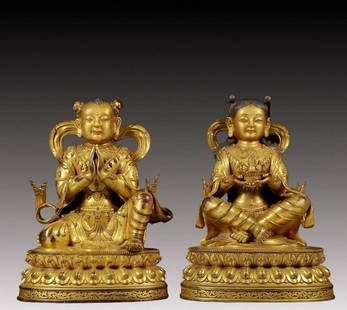Two solemn gilt bronze figures: Two solemn gilt bronze figures Ming Dynasty,China. The figures have clear facial contours and vivid expressions. Costumes,fabric textures and decorative details are crafted to life. The works are full