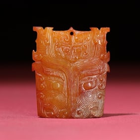 An Exquisite White Jade Beast-Face Pattern Pendant
