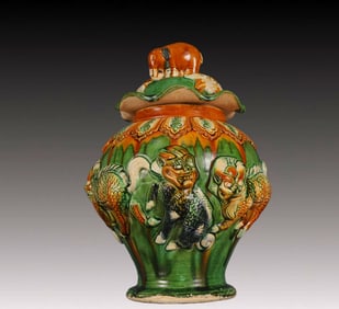 A Rare Tang Tri-Color Glazed Pottery Auspicious Beast Pattern Cover Jar