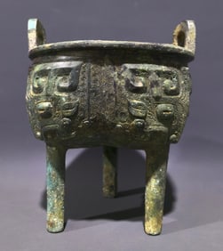 An Archaic Bronze Taotie Pattern Double-Ears and Tripod Censer