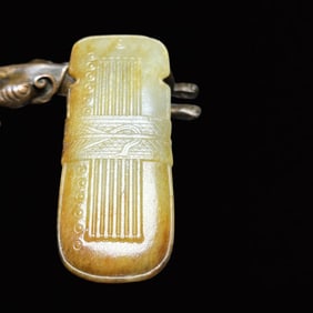 An Exquisite White Jade Pendant
