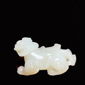 An Exquisite White Jade Auspicious Beast Hand Piece