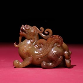 An Exquisite White Jade Auspicious Beast Ornament