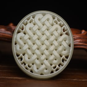 An Exquisite White Jade Pendant