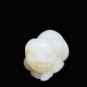 An Exquisite White Jade Pig Hand Piece