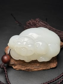 An Exquisite White Jade Pig Pendant