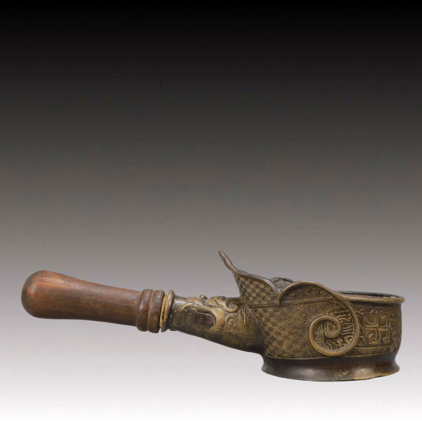 An Exquisite Bronze Dragon Pattern Spoon (1 of 8)