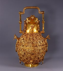 A Rare Gilt Bronze Hollow Flower and Phoenix Pattern Ewer