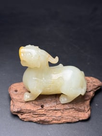 An Exquisite Gaogu Jade Auspicious Beast Ornament