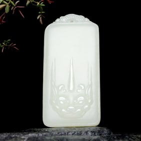 An Exquisite White Jade Beast-Face Pattern Pendant
