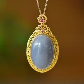 An Exquisite Sterling Silver-Gold Plated Inlaid Purple Jade Pendant