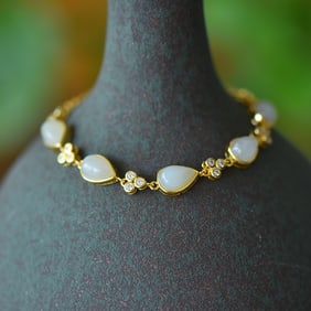 An Exquisite Sterling Silver-Gold Plated Inlaid White Jade Bracelet