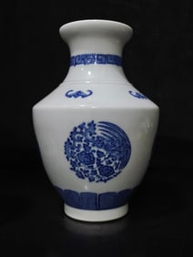 A Rare Blue and White Bat and Phoenix Pattern Zun