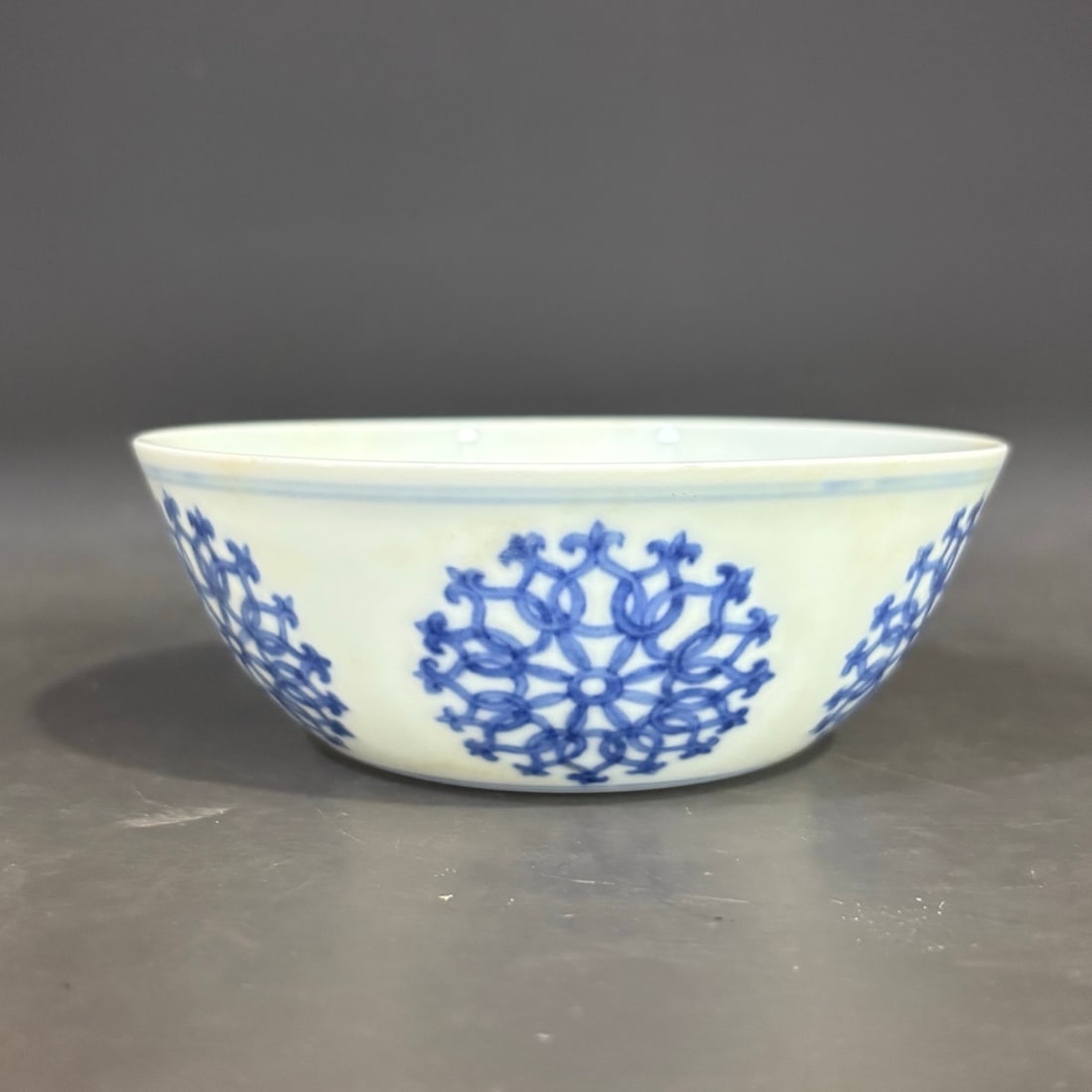 A Rare Blue and white Round Flower Pattern Lying Foot Cup: A Rare Blue and white Round Flower Pattern Lying Foot Cup ,Ming Dynasty, China,Chenghua Six-character Mark,Size:1.7inx4.7in 青花团花纹卧足杯,中