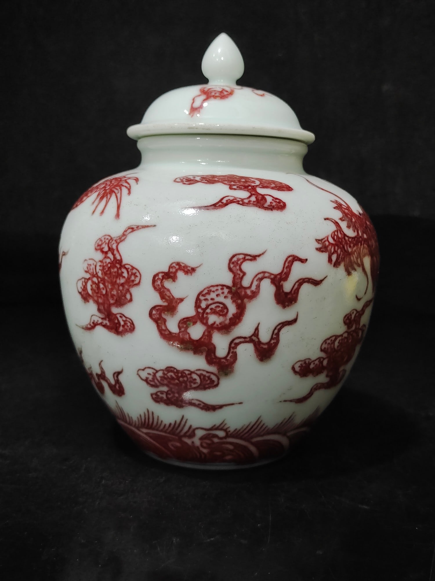 A Rare Underglaze-Red Cloud and Dragon Pattern Jar: A Rare Underglaze-Red Cloud and Dragon Pattern Jar,Qing Dynasty, China,Kangxi Six-character Mark,Size:5.9inx4.3in 釉里红云龙纹罐,中国清É