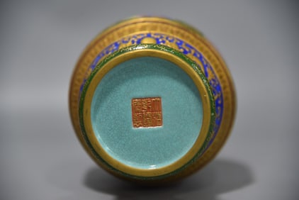 A Rare Carved and Hollowed Brush Pot with Gilded Sea Wave Patterns