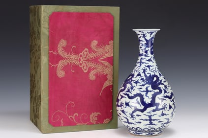 A Rare Blue and White Auspicious Cloud and Dragon Pattern Okho Spring Bottle