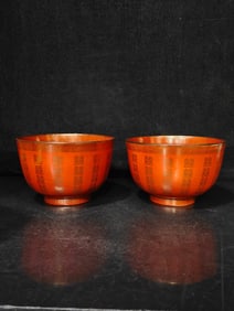 A pair of Rare Red Ground Outline in gold “XI??-characterPattern Cup