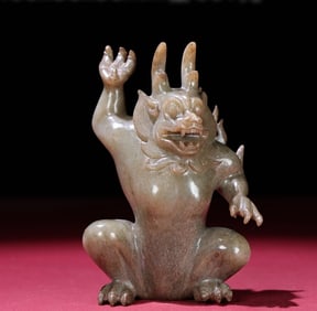 An Exquisite White Jade Auspicious Beast Ornament