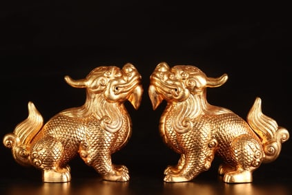A Pair of Rare Gilt Bronze Kylin Ornaments