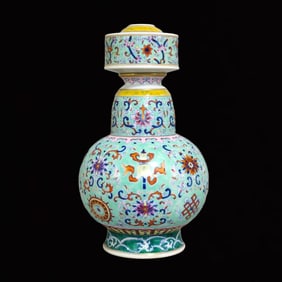 An Exquisite Turquoise Glazed Lotus and Eight Treasures Pattern Vase