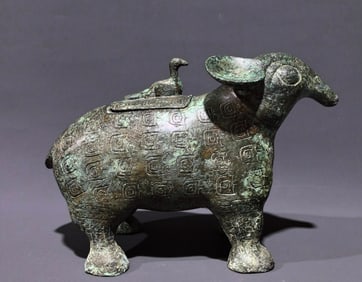 An Archaic Bronze Beast-Shaped Zun,With Inscription