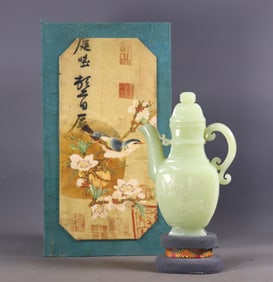 An Exquisite White Jade Flower and Bird Pattern Ewer
