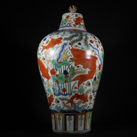 An Exquisite Wucai Lotus and Fish Pattern Vase