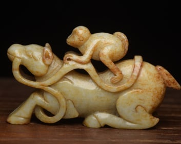 An Exquisite White Jade Horse and Monkey Hand Piece