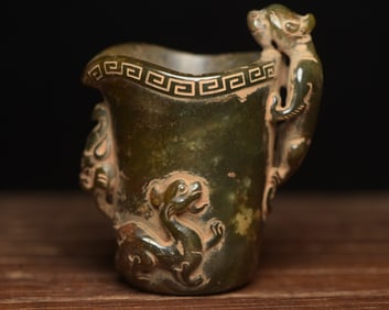 An Exquisite White Jade Dragon Pattern Cup