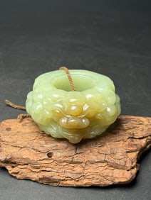 An Exquisite White Jade Beast-Face Pattern Fingerstall