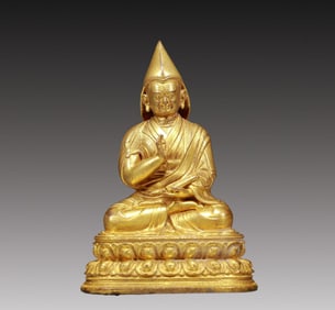 A Solemn Gilt Bronze Statue of Guru