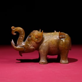 An Exquisite Yellow Jade Elephant Ornament