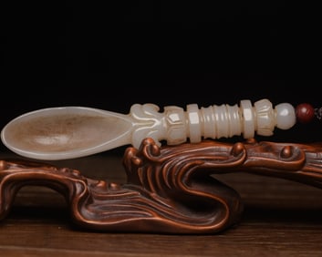 An Exquisite White Jade Pendant
