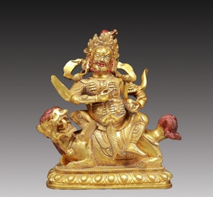 A Solemn Gilt Bronze Statue of Mammon Rides the Lion