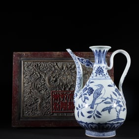 A Rare Blue and White Flower and Bird Pattern Ewer
