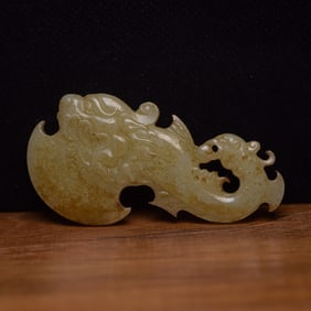 An Exquisite White Jade Dragon Pattern Pendant