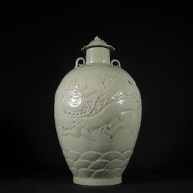 A Rare Yue yao Celadon Seawater and Dragon Pattern Cover Jar