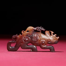 An Exquisite Gaogu Jade Auspicious Beast Ornament